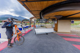 A mountain biker getting ready to board the detachable chairlift at Clos Bertrand in Val d'Allos – Le Seignus in summer