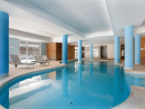 Residence swimming pool with sun loungers