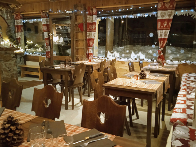 Restaurant dining room, dining tables, Christmas decorations, wooden furniture