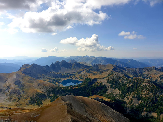 Panoramic view of the Upper Verdon massifs, from Lake Allos in the summer season, from the summit of Mont Pelat