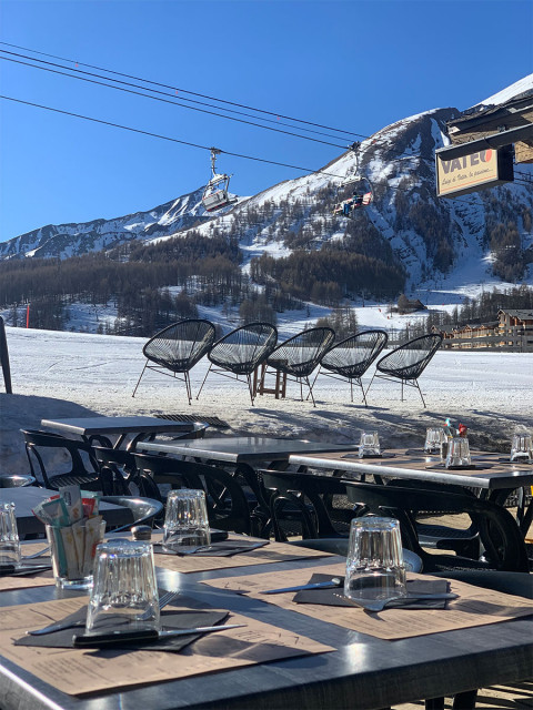 Views of the ski slopes and mountains from the property's sunny terrace, chairlift nearby