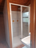 bathroom with bright shower tray