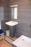 Bathroom with shower tray, tiles