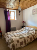 Bright bedroom with double bed, window