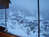 View of the snow-covered ski resort from the balcony