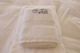White towel embroidered the rented chalet's name