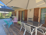 Outdoor terrace of the chalet with outdoor furniture