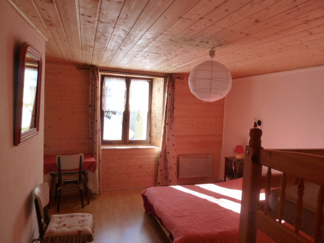 bright bedroom (window) with double bed and bunk beds