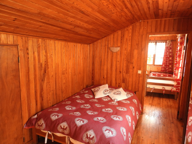 Attic bedroom with double bed, door to bedroom with single bed, wooden furniture - © N Pellissier Attic bedroom with double bed, door to bedroom with single bed, wooden furniture