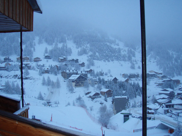 View of the snow-covered ski resort from the balcony